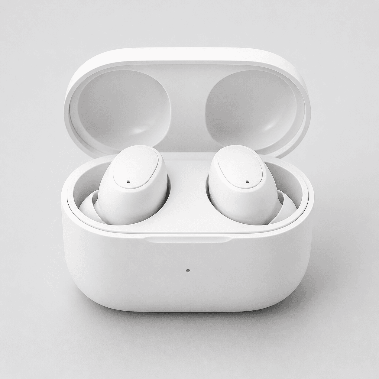 Open white charging case with two matching wireless earbuds