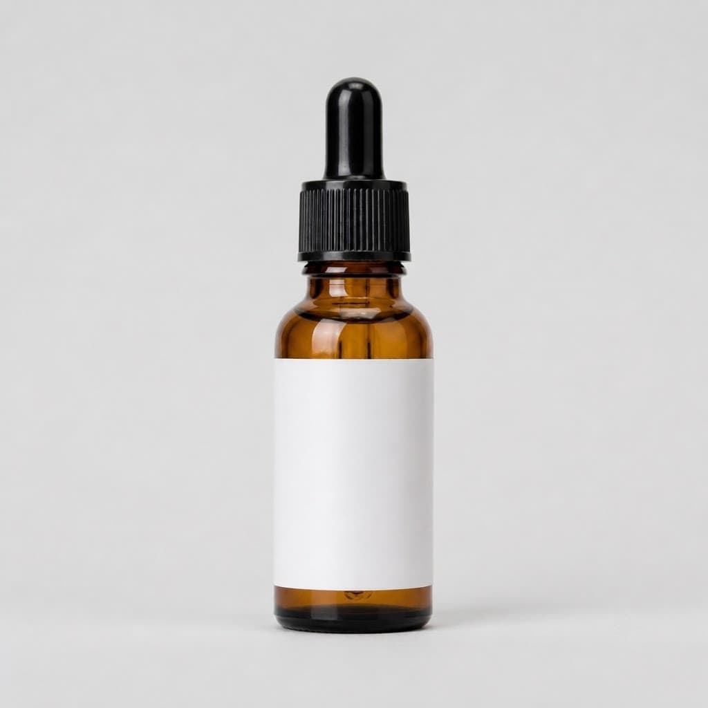 Close detail image of a generic amber glass serum dropper bottle