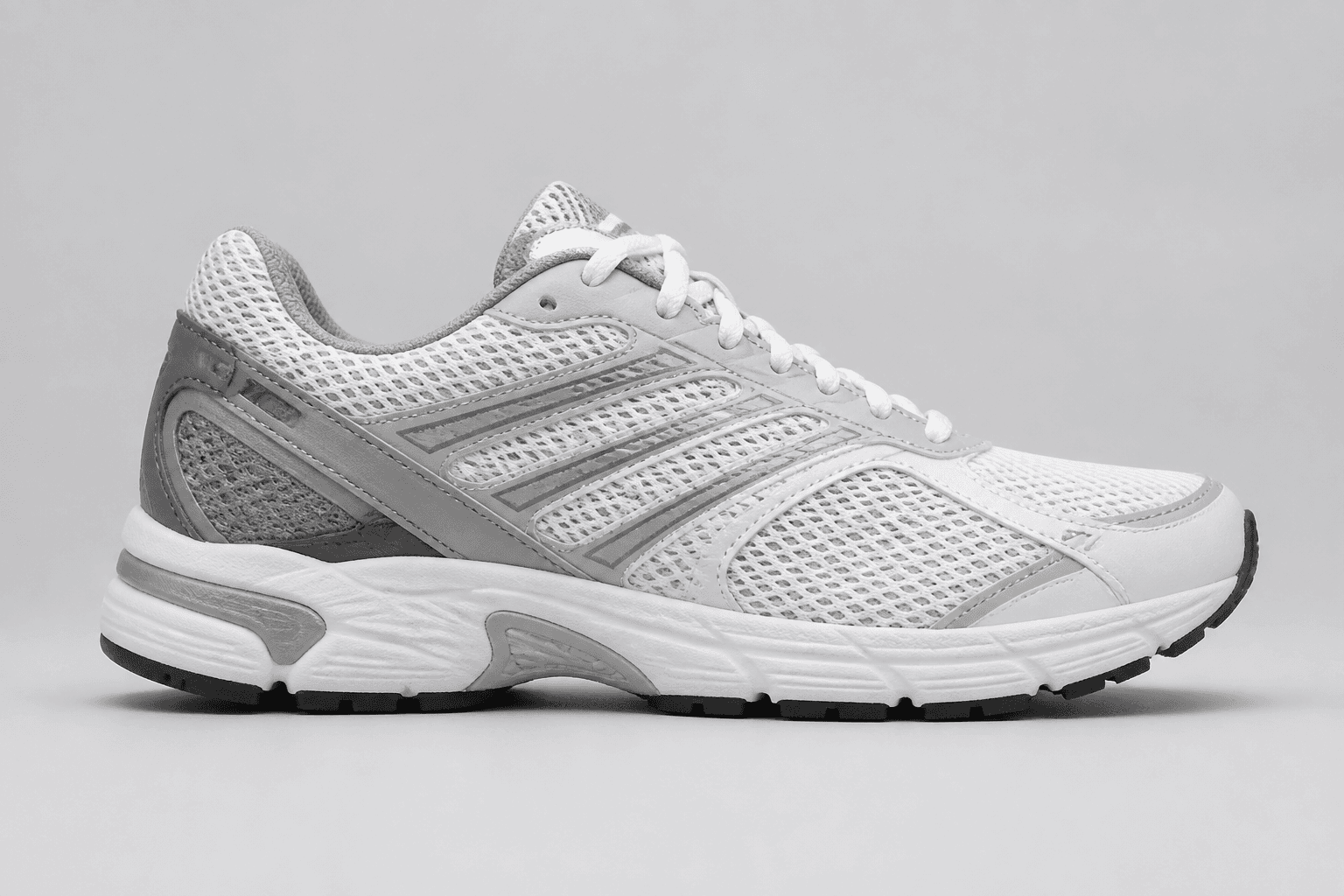 Unbranded neutral running shoe source asset on a plain background
