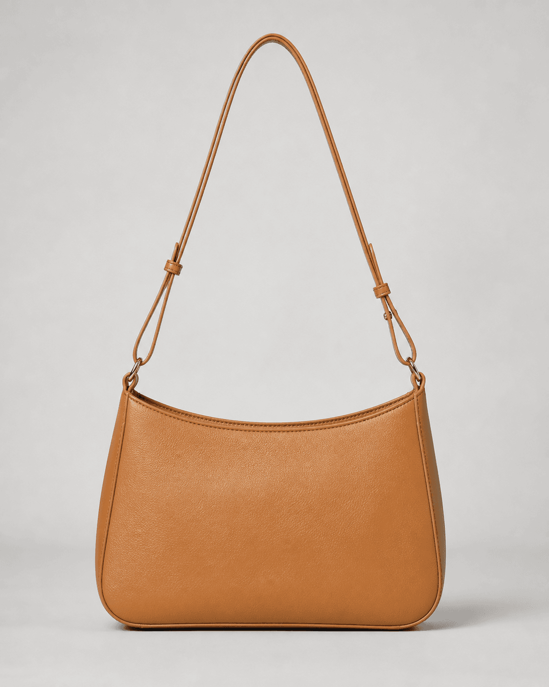 Unbranded warm tan handbag source asset on a plain background